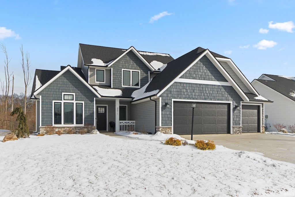 craftsman-style home with a garage