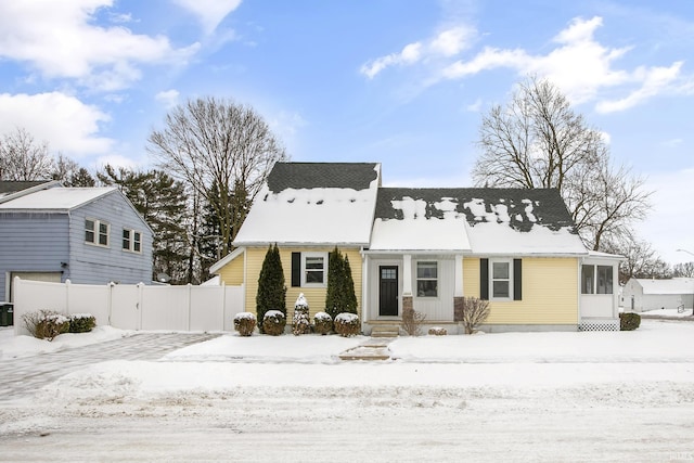 view of snow covered front of house