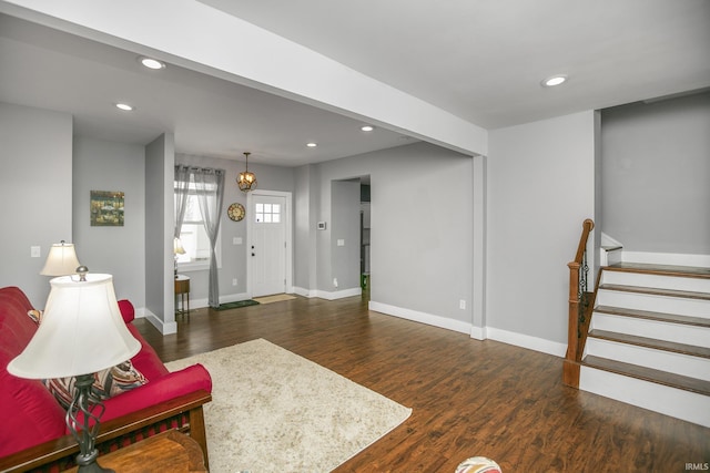 living room with dark hardwood / wood-style floors