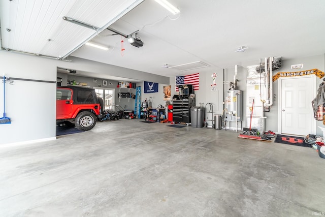 garage featuring water heater and a garage door opener
