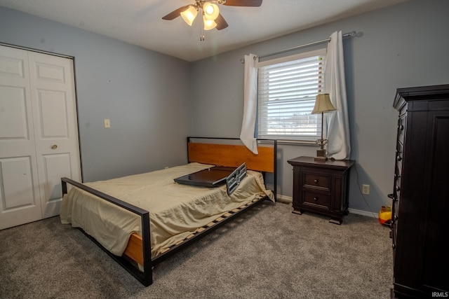 carpeted bedroom featuring ceiling fan and baseboards