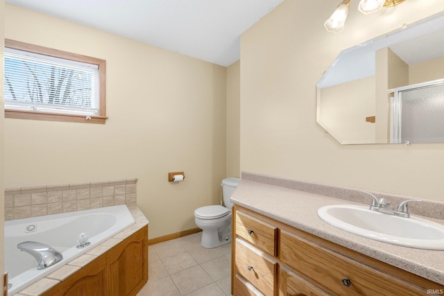 full bathroom featuring baseboards, toilet, a garden tub, tile patterned flooring, and vanity