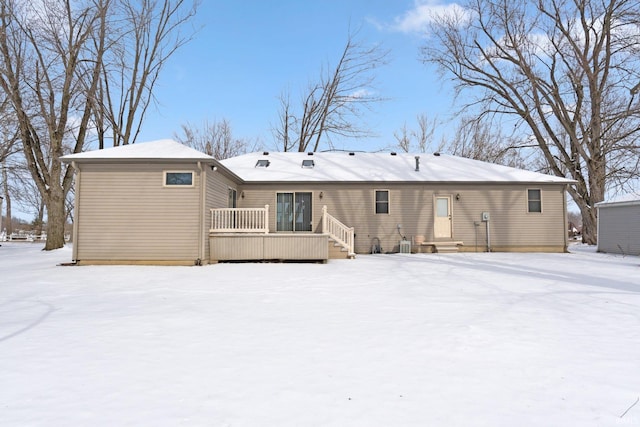 view of snow covered house