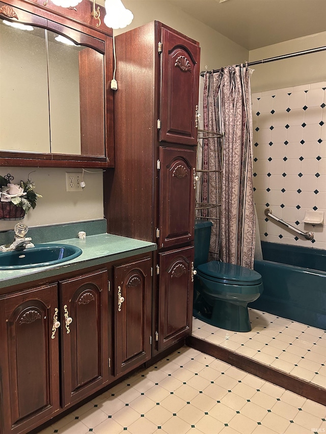 full bathroom featuring vanity, shower / bath combination with curtain, and toilet