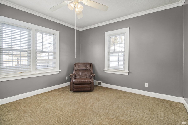 unfurnished room with ornamental molding, visible vents, light carpet, and baseboards