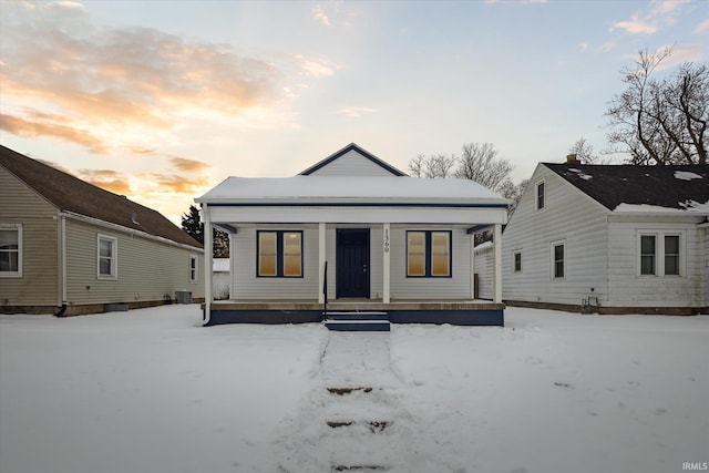 view of front of property featuring covered porch and central AC unit