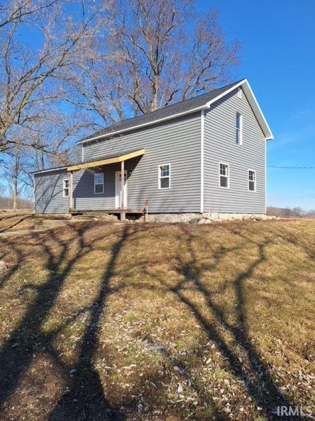 exterior space with a yard