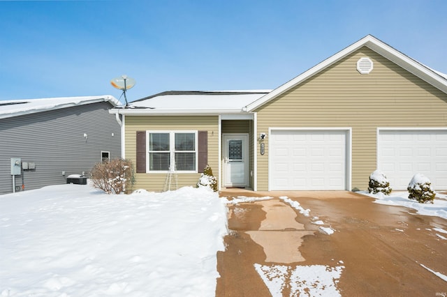 view of front of property featuring a garage