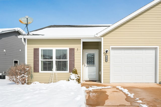 view of front of property featuring an attached garage