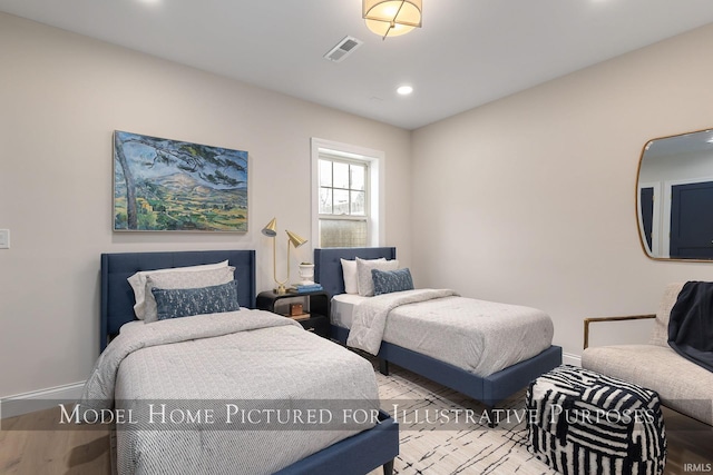 bedroom with recessed lighting, visible vents, and baseboards