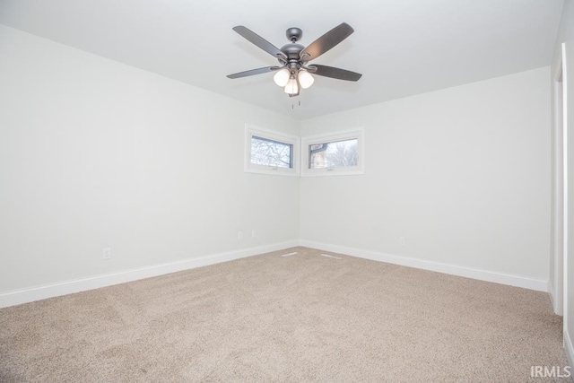 6400 Jefferson Ave, Evansville, IN 47715 - spare room featuring carpet floors, ceiling fan, and baseboards