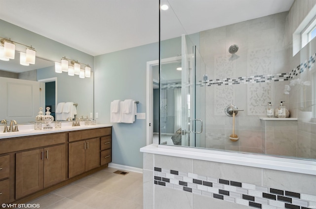 8973 Belmont Woods, Fort Wayne, IN 46835 - bathroom featuring a stall shower, visible vents, a sink, and double vanity
