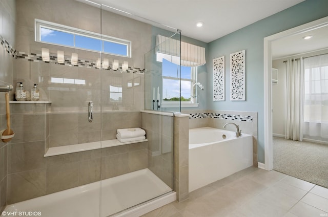 8973 Belmont Woods, Fort Wayne, IN 46835 - bathroom with a garden tub, recessed lighting, a stall shower, baseboards, and tile patterned floors
