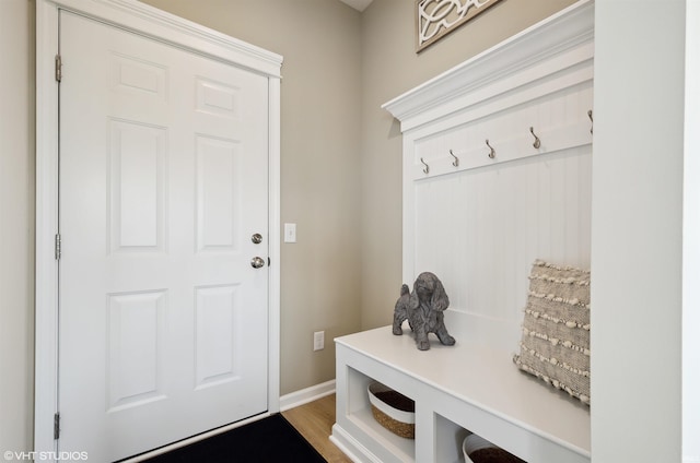 8973 Belmont Woods, Fort Wayne, IN 46835 - mudroom featuring baseboards and wood finished floors