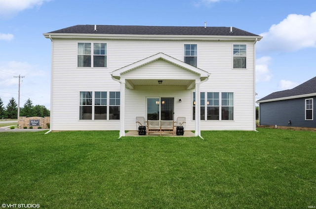 8973 Belmont Woods, Fort Wayne, IN 46835 - rear view of house featuring a patio and a lawn