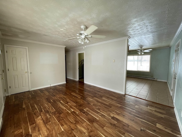 empty room featuring a baseboard heating unit, ceiling fan, a textured ceiling, and dark wood finished floors