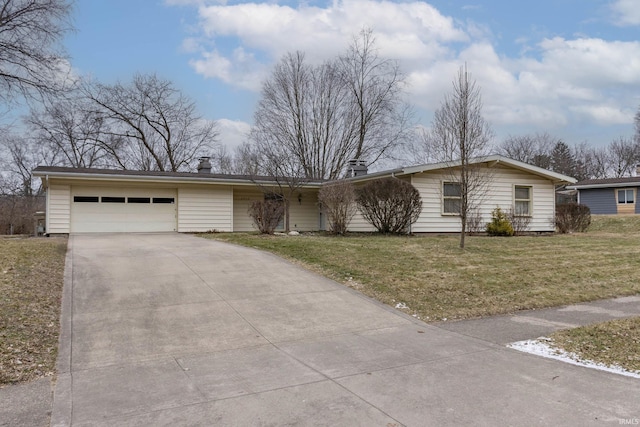 single story home with a garage, concrete driveway, and a front yard