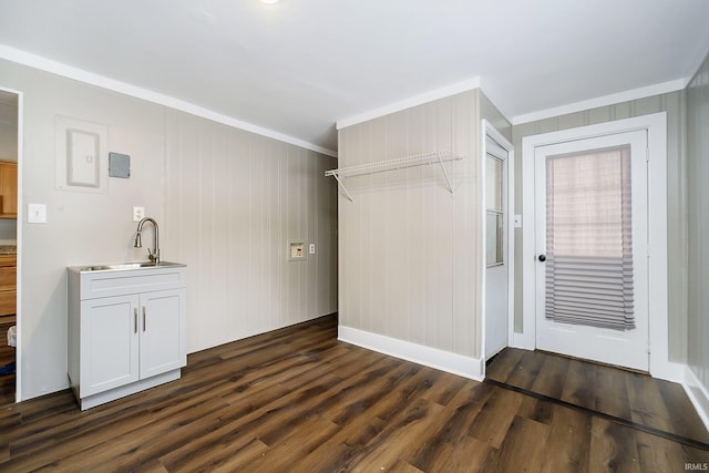 602 N Harrison St, Alexandria, IN 46001 - laundry area featuring ornamental molding, dark wood-style flooring, and a sink