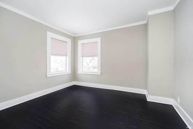 602 N Harrison St, Alexandria, IN 46001 - empty room featuring ornamental molding, baseboards, and wood finished floors