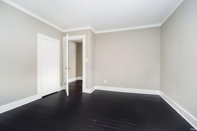 602 N Harrison St, Alexandria, IN 46001 - unfurnished room featuring baseboards, dark wood finished floors, and crown molding