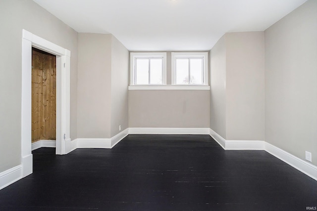 602 N Harrison St, Alexandria, IN 46001 - empty room featuring baseboards and dark wood-style flooring