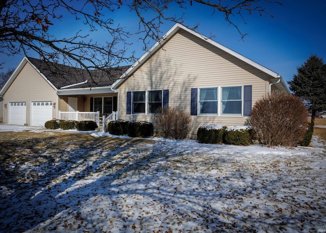 exterior space featuring a garage and a porch