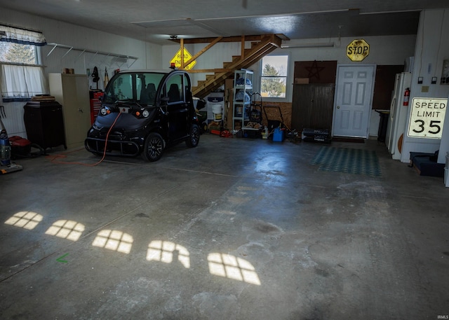 garage featuring freestanding refrigerator