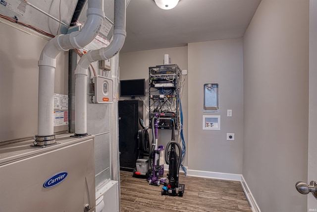 utility room with heating unit