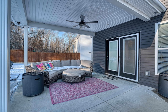 view of patio / terrace featuring outdoor lounge area, ceiling fan, and fence