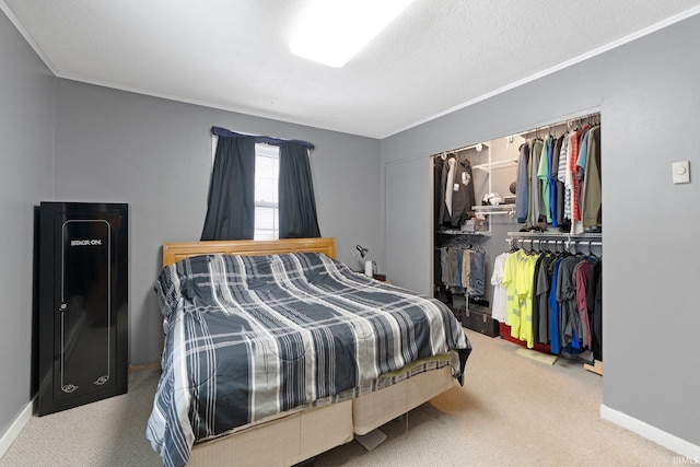 bedroom featuring carpet floors, a closet, and baseboards