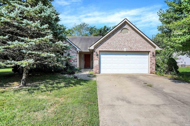 single story home featuring a garage, concrete driveway, brick siding, and a front yard