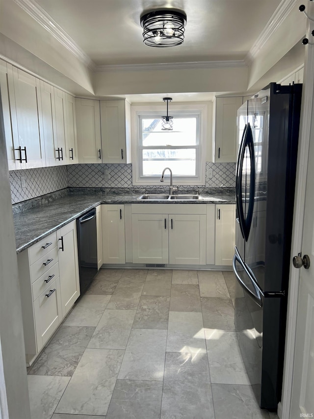 kitchen with ornamental molding, white cabinets, a sink, and black appliances