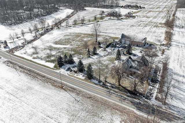 snowy aerial view with a rural view