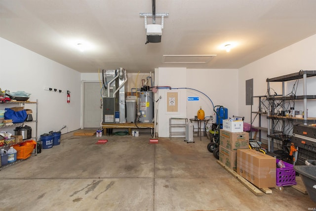 garage featuring heating unit, electric panel, gas water heater, and a garage door opener