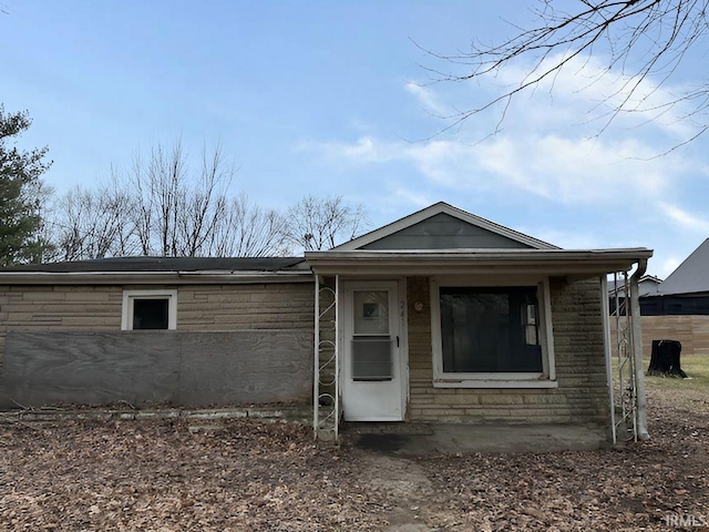 view of front of home with stone siding