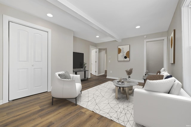 living room with baseboards, wood finished floors, beam ceiling, and recessed lighting