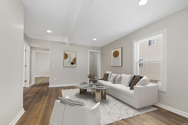 living room with recessed lighting, beamed ceiling, baseboards, and wood finished floors