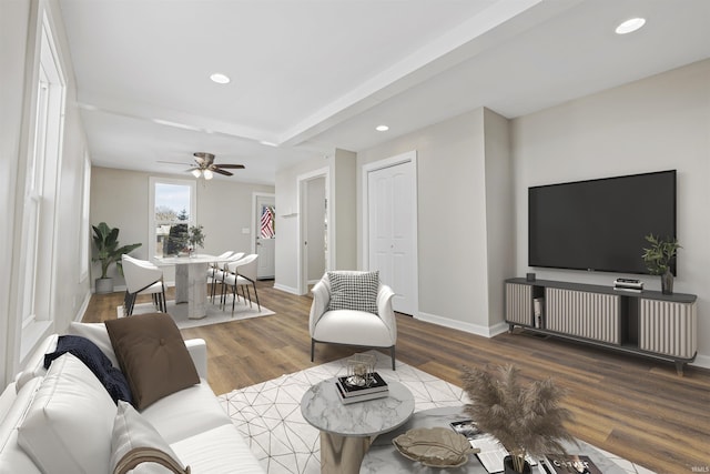 living room featuring recessed lighting, ceiling fan, baseboards, and wood finished floors