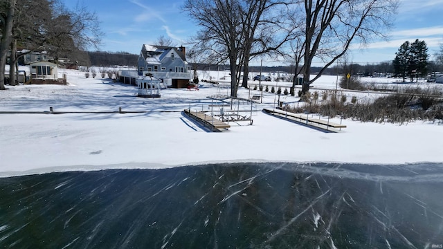 view of yard covered in snow