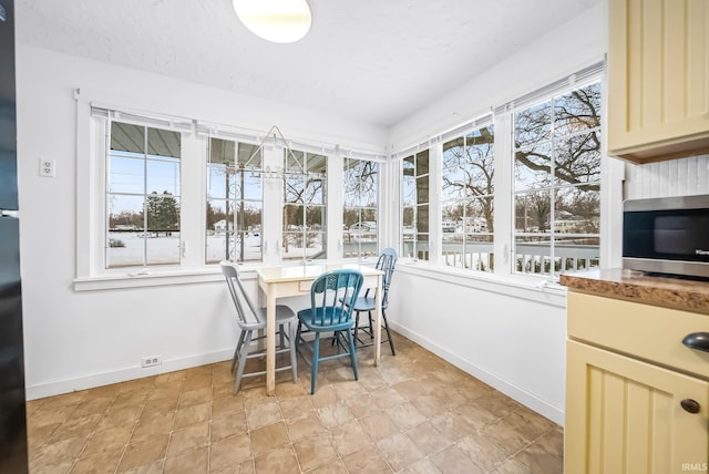 sunroom with a healthy amount of sunlight