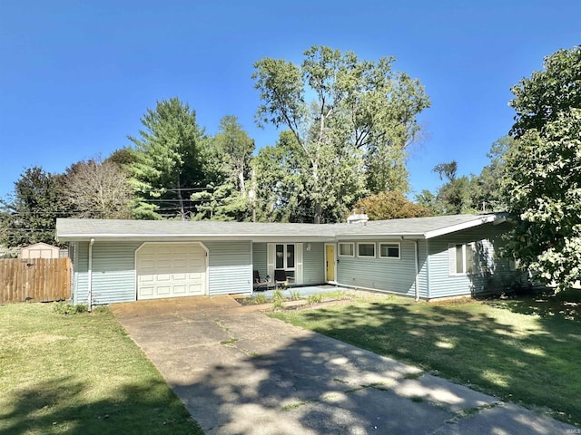 single story home with an attached garage, driveway, fence, and a front lawn