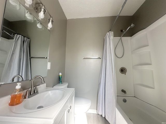 full bath featuring toilet, shower / tub combo, a textured ceiling, vanity, and wood finished floors