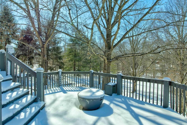 view of snow covered deck