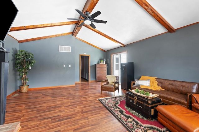 living room with visible vents, lofted ceiling with beams, a ceiling fan, wood finished floors, and baseboards