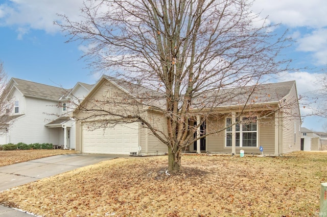 view of front of home with a garage and driveway