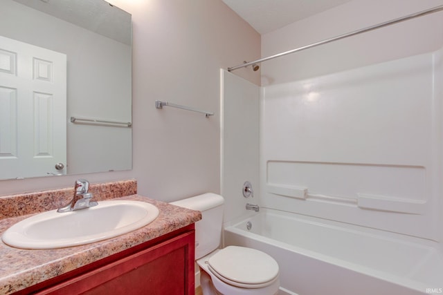 full bath featuring toilet,  shower combination, and vanity