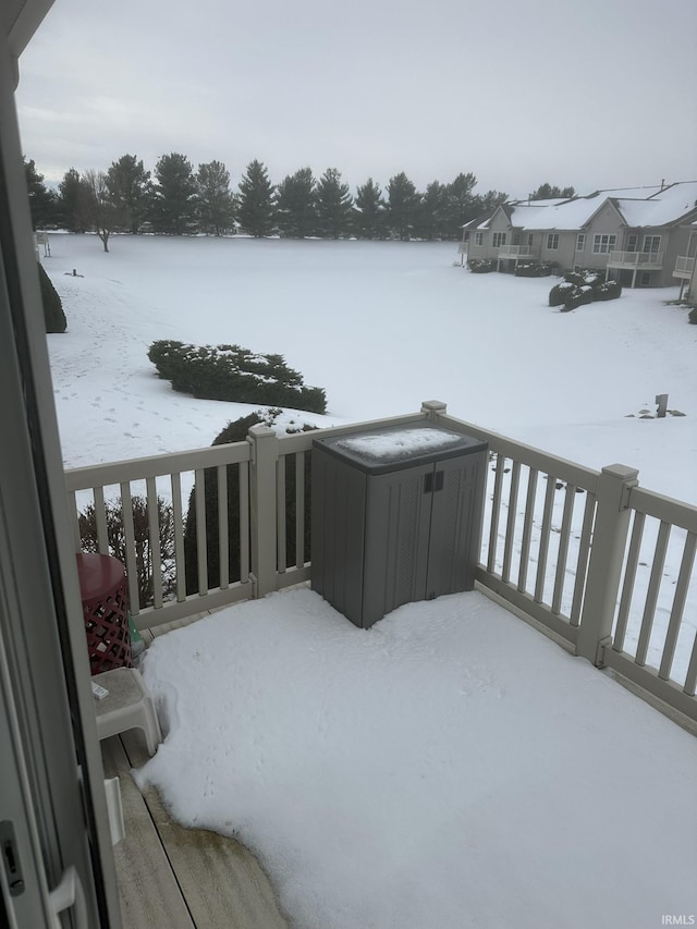 view of snow covered deck