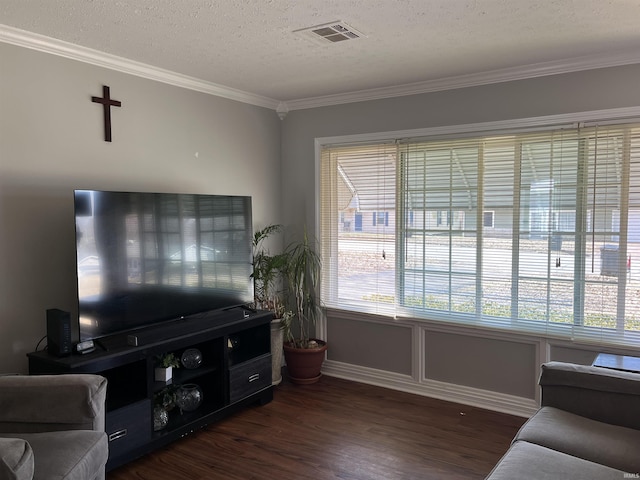 living area featuring crown molding, a textured ceiling, visible vents, and dark wood-type flooring