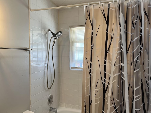 full bathroom featuring shower / bathtub combination with curtain