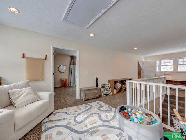 interior space featuring attic access and recessed lighting